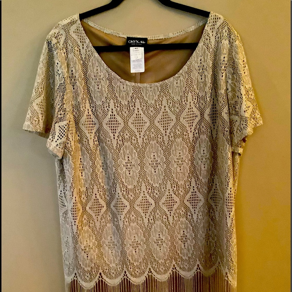 Woman’s vintage skirt set by Onyx Nite size 2X short sleeved gold with fringes